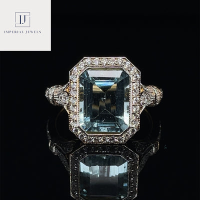 18CT Yellow Gold Aquamarine and Diamond Ring