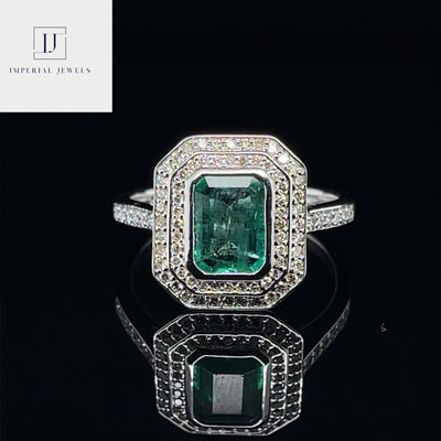 18CT White Gold Emerald and Diamond ring