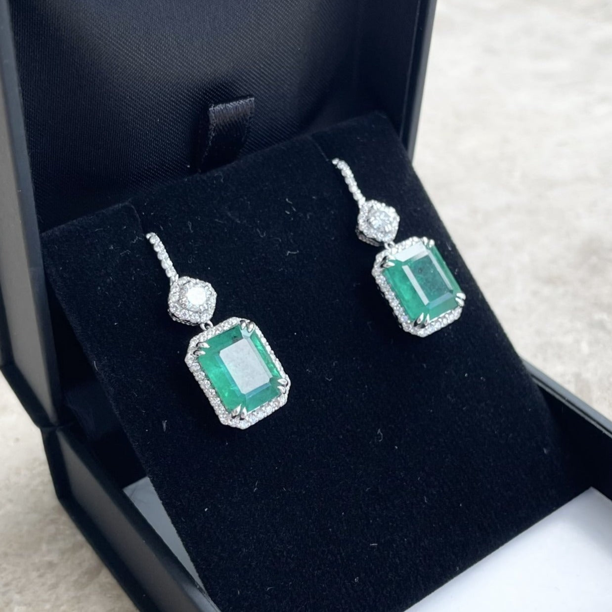 18CT White Gold Emerald and Diamond Earrings
