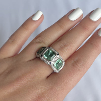 18CT rose gold Trilogy Colombian Emerald, Blue Sapphire and Diamond ring