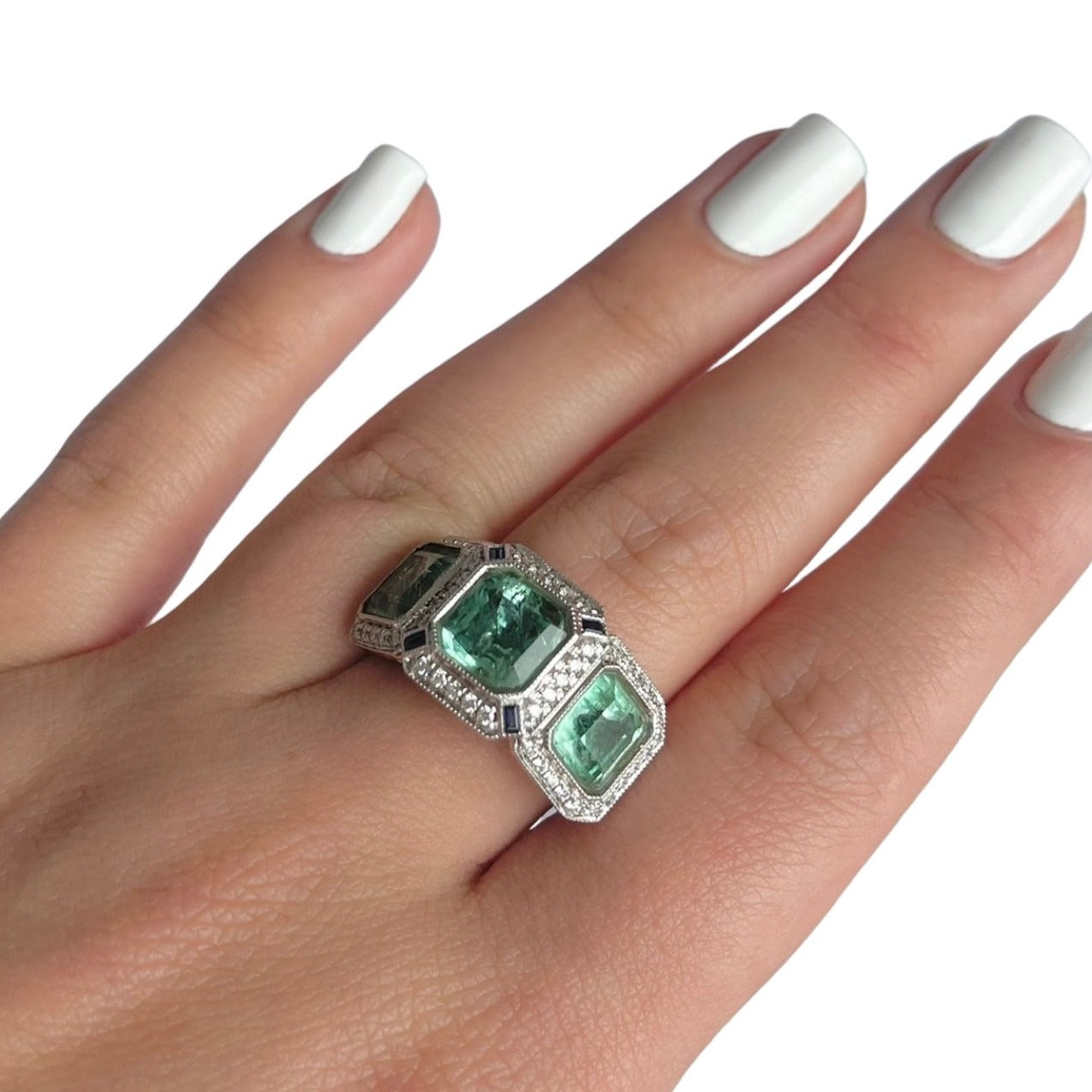 18CT rose gold Trilogy Colombian Emerald, Blue Sapphire and Diamond ring
