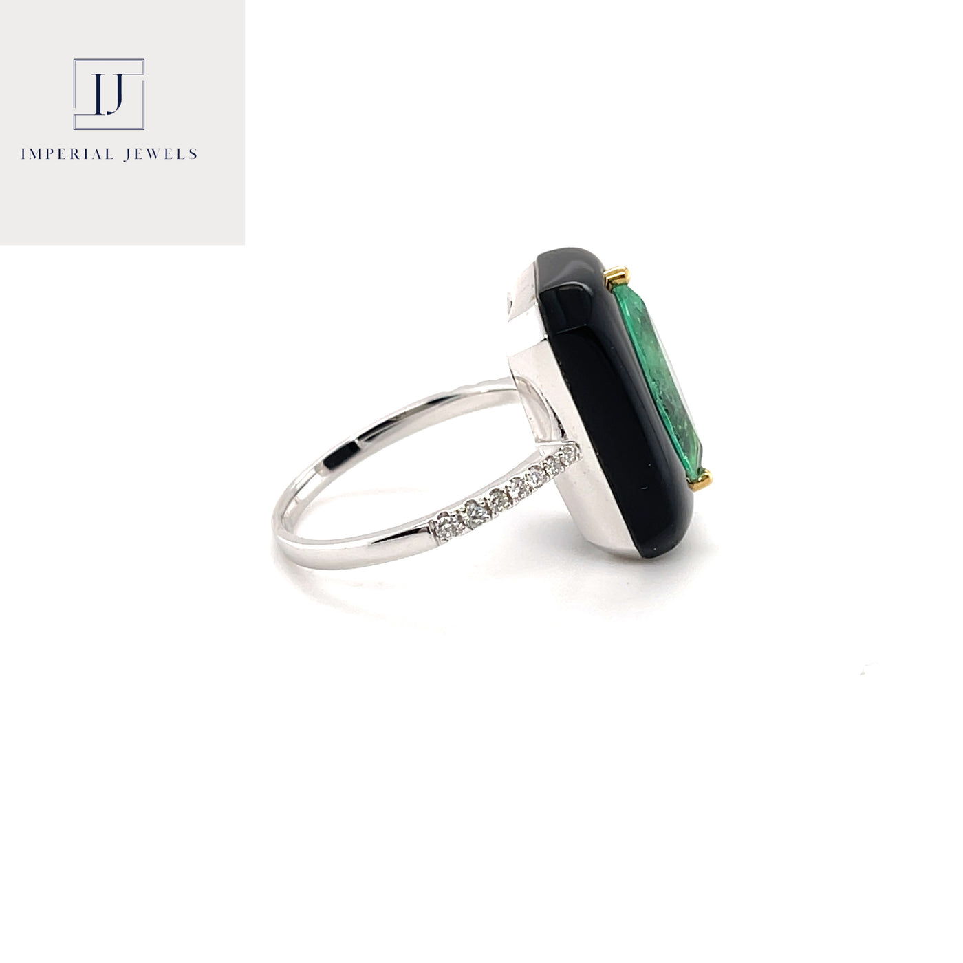18CT white gold marquise colombian emerald, onyx and diamond ring