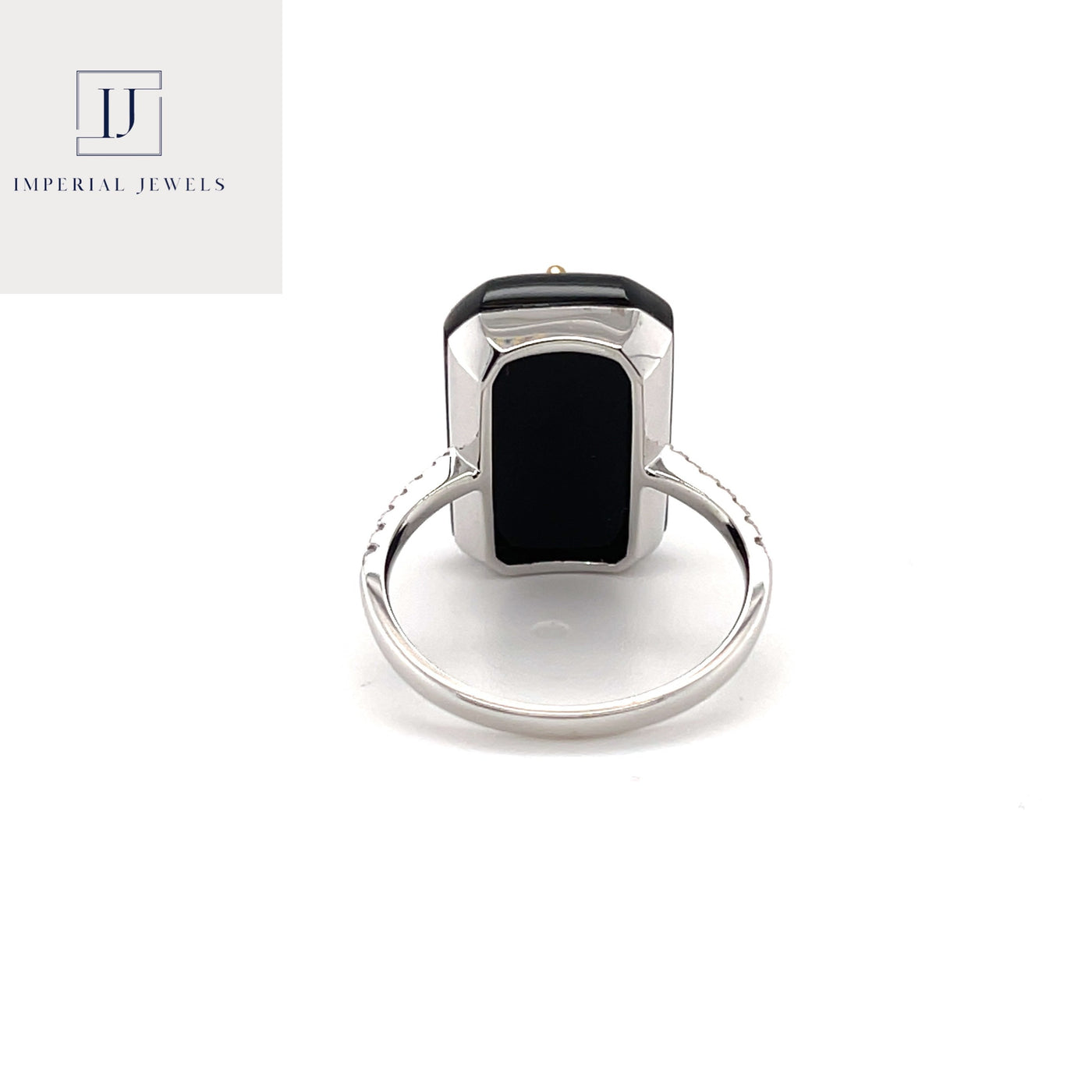 18CT white gold marquise colombian emerald, onyx and diamond ring