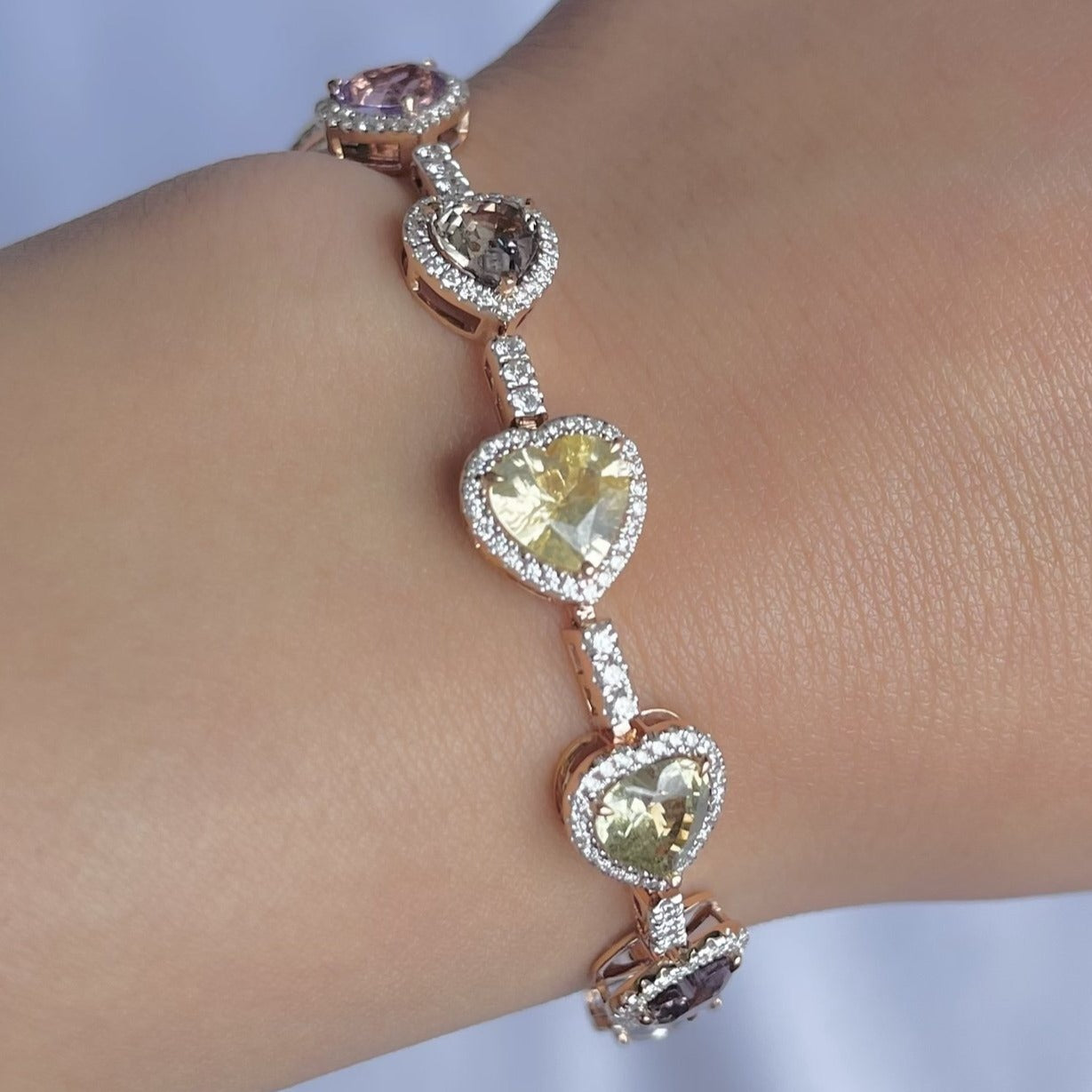 18CT rose gold multi coloured heart sapphire and diamond bracelet