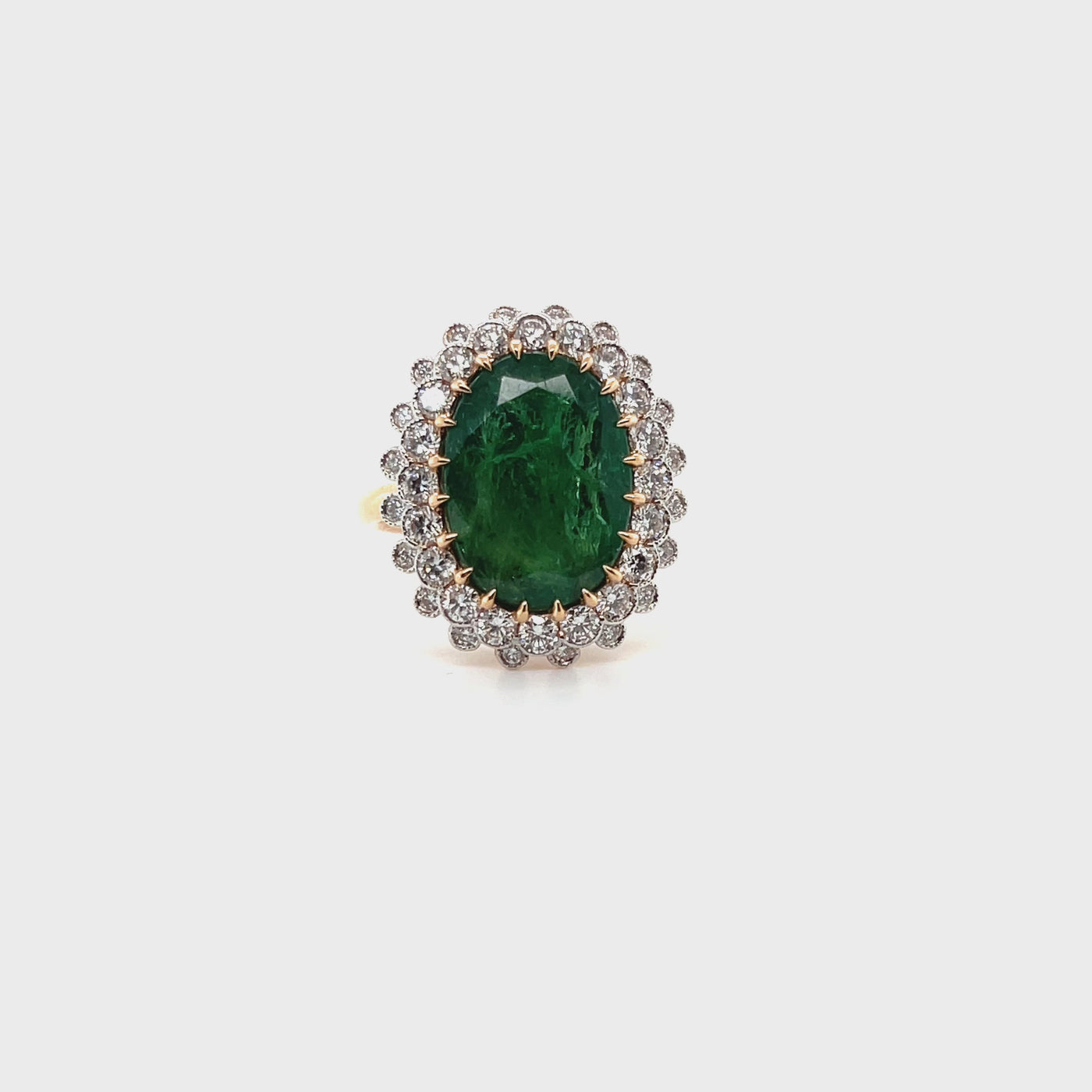 18ct rose gold Emerald and Diamond double halo dress ring