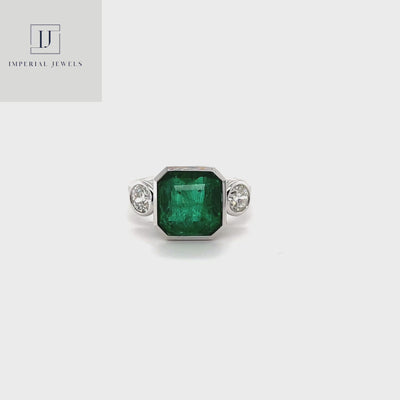 18CT White Gold Emerald and Diamond Ring