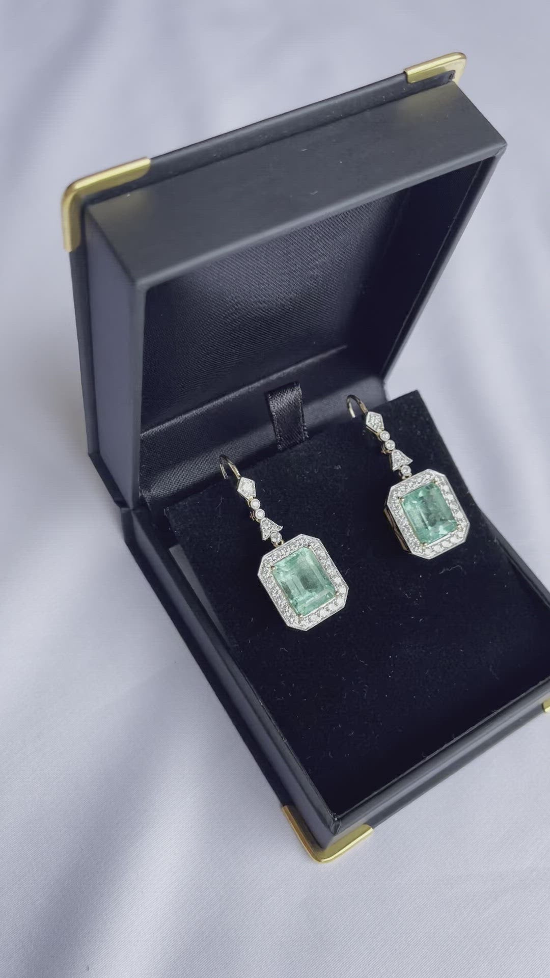 18CT yellow gold Colombian emerald and diamond earrings