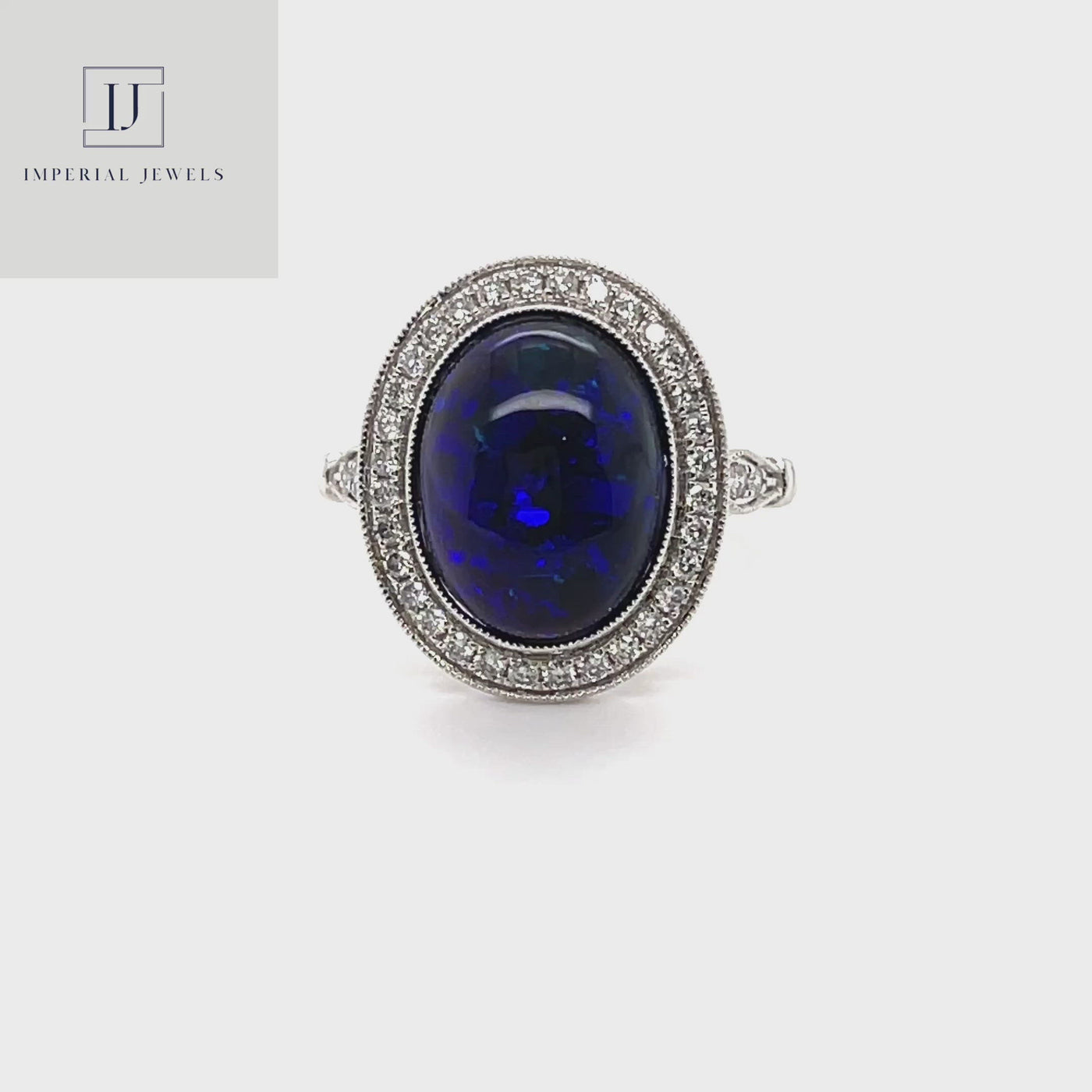 18CT White Gold Opal and Diamond Ring