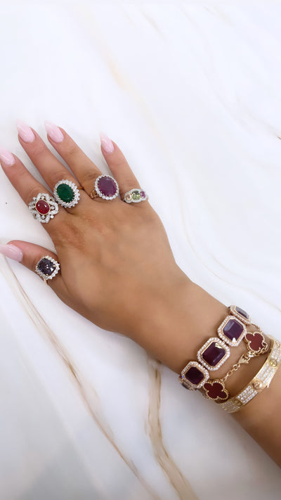 18ct rose gold Emerald and Diamond double halo dress ring