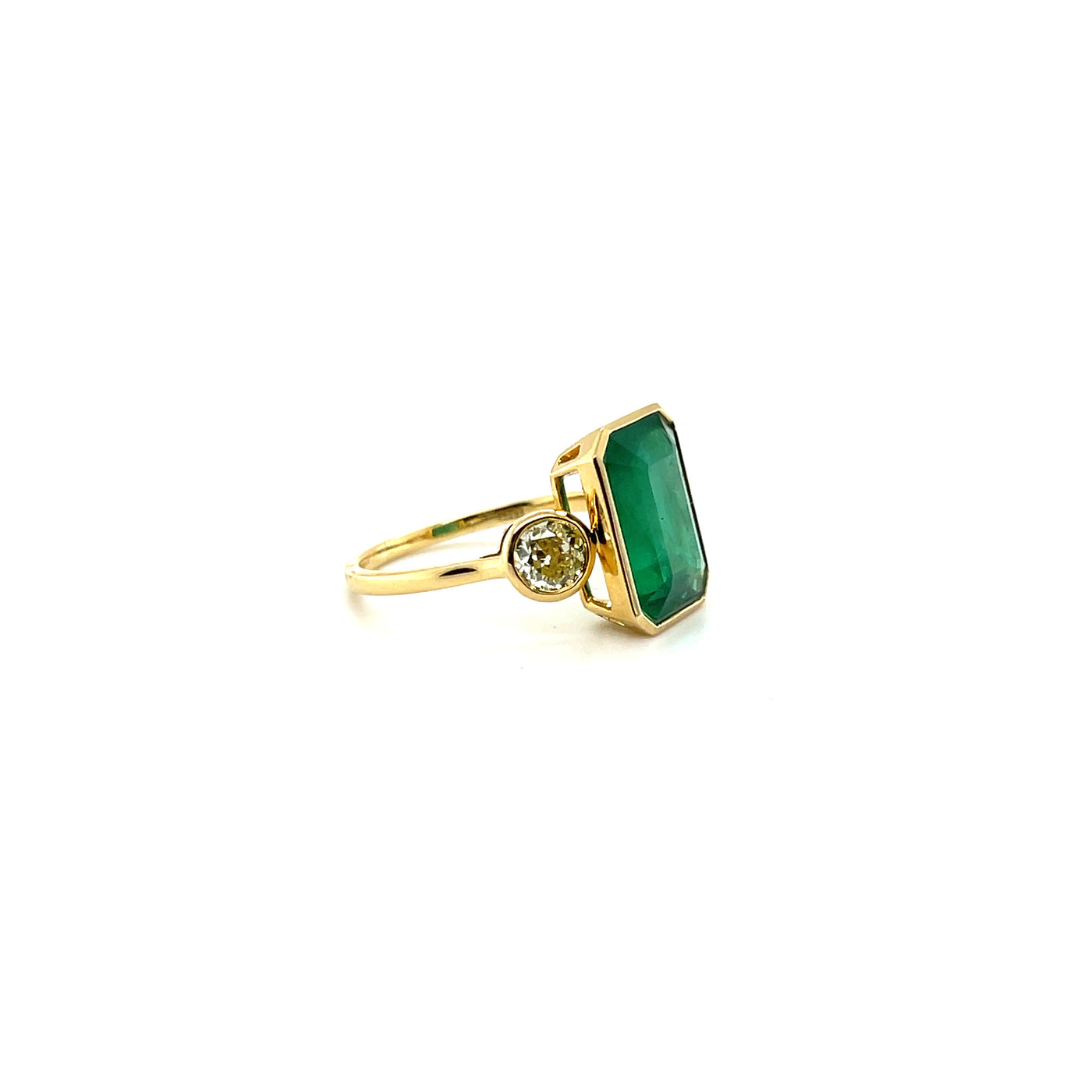 18ct yellow gold emerald and diamond trilogy dress ring