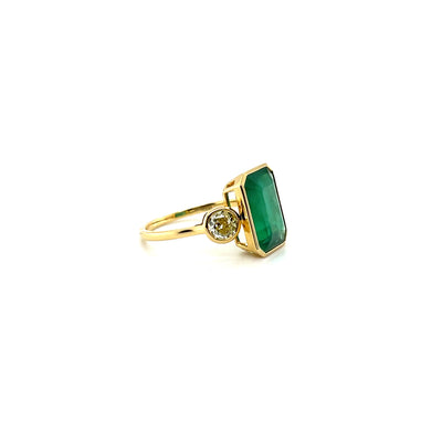 18ct yellow gold emerald and diamond trilogy dress ring
