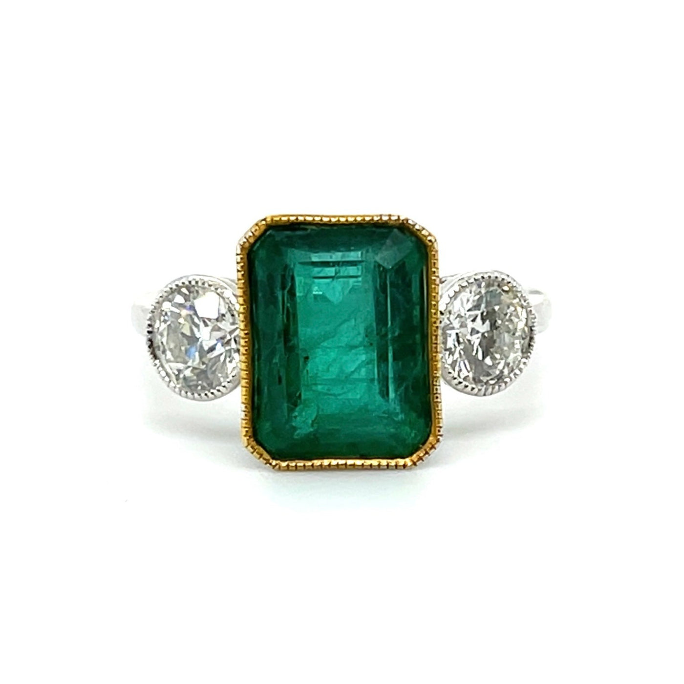 Platinum Emerald and Diamond trilogy ring