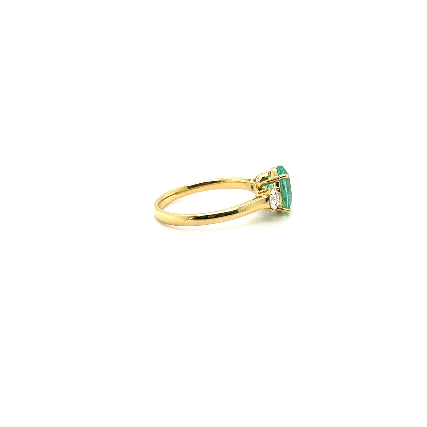 18 karat Emerald and Diamond trilogy ring