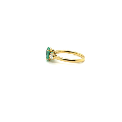 18 karat Emerald and Diamond trilogy ring